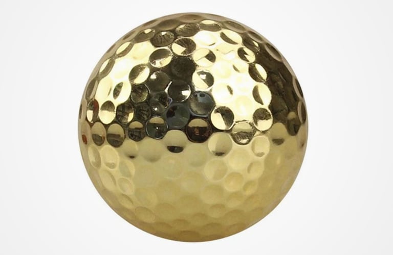 Guldfärgad Golfboll