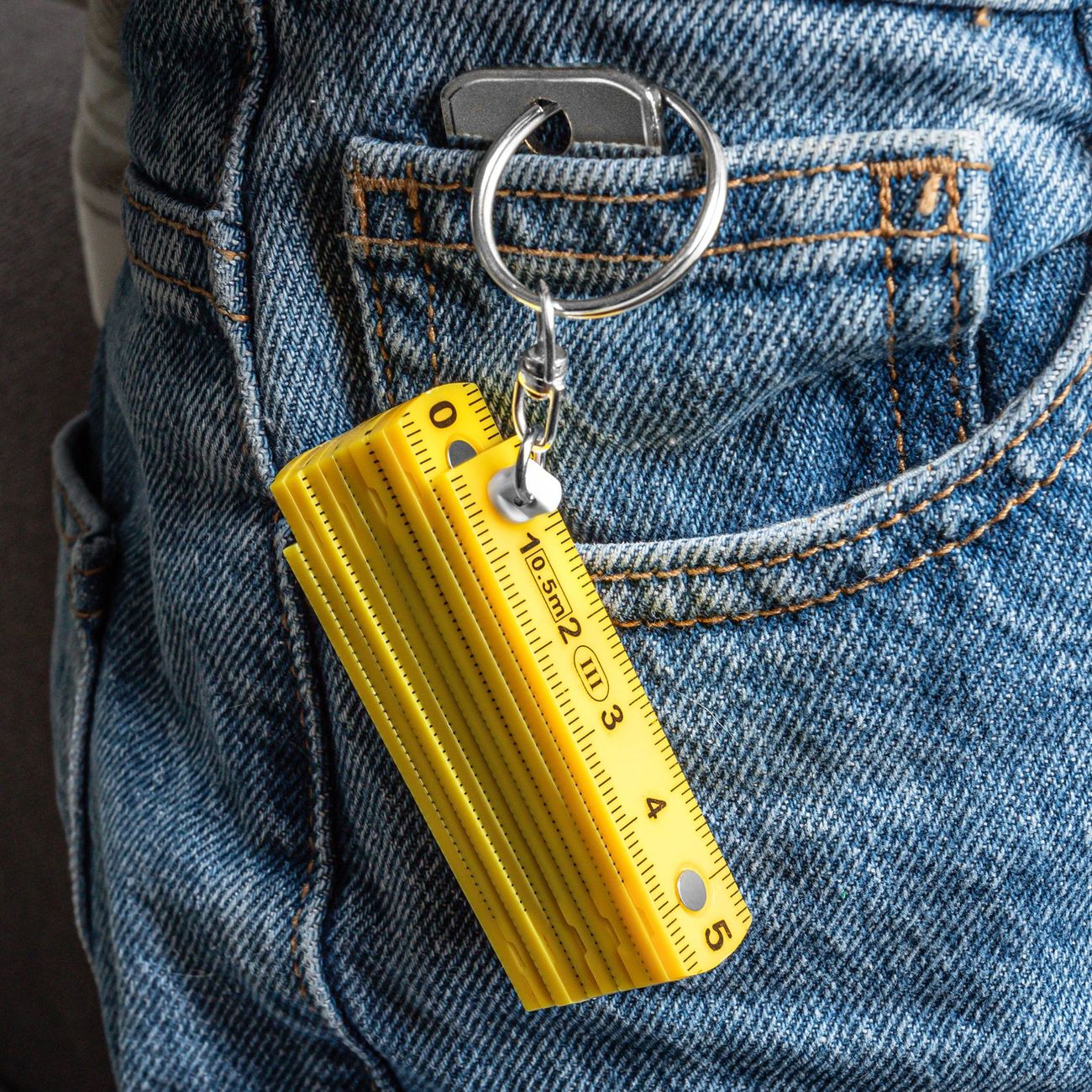 Nyckelring Tumstock Vikbar