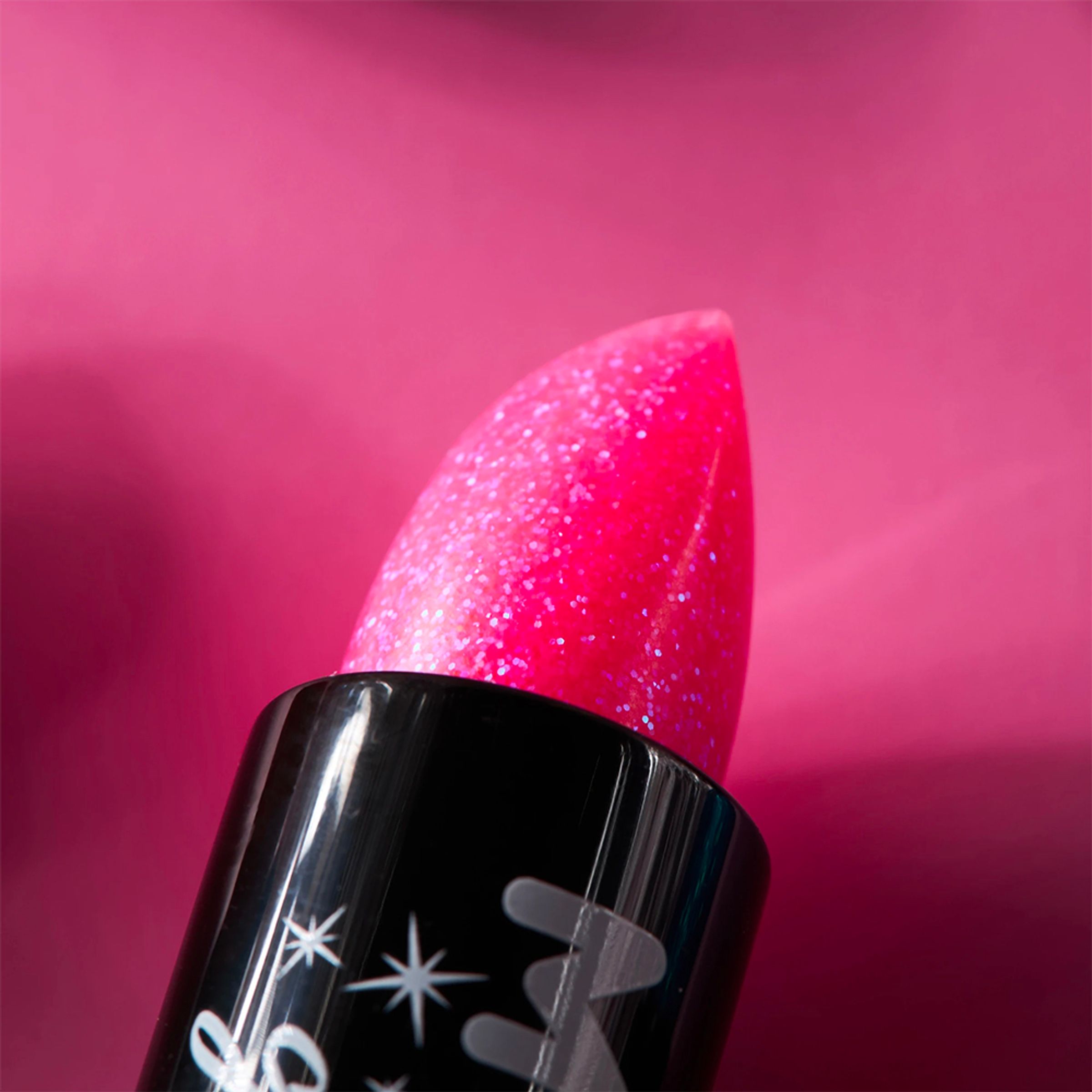 Läs mer om Moon Creations Iridescent Glitter Lipstick - Rosa