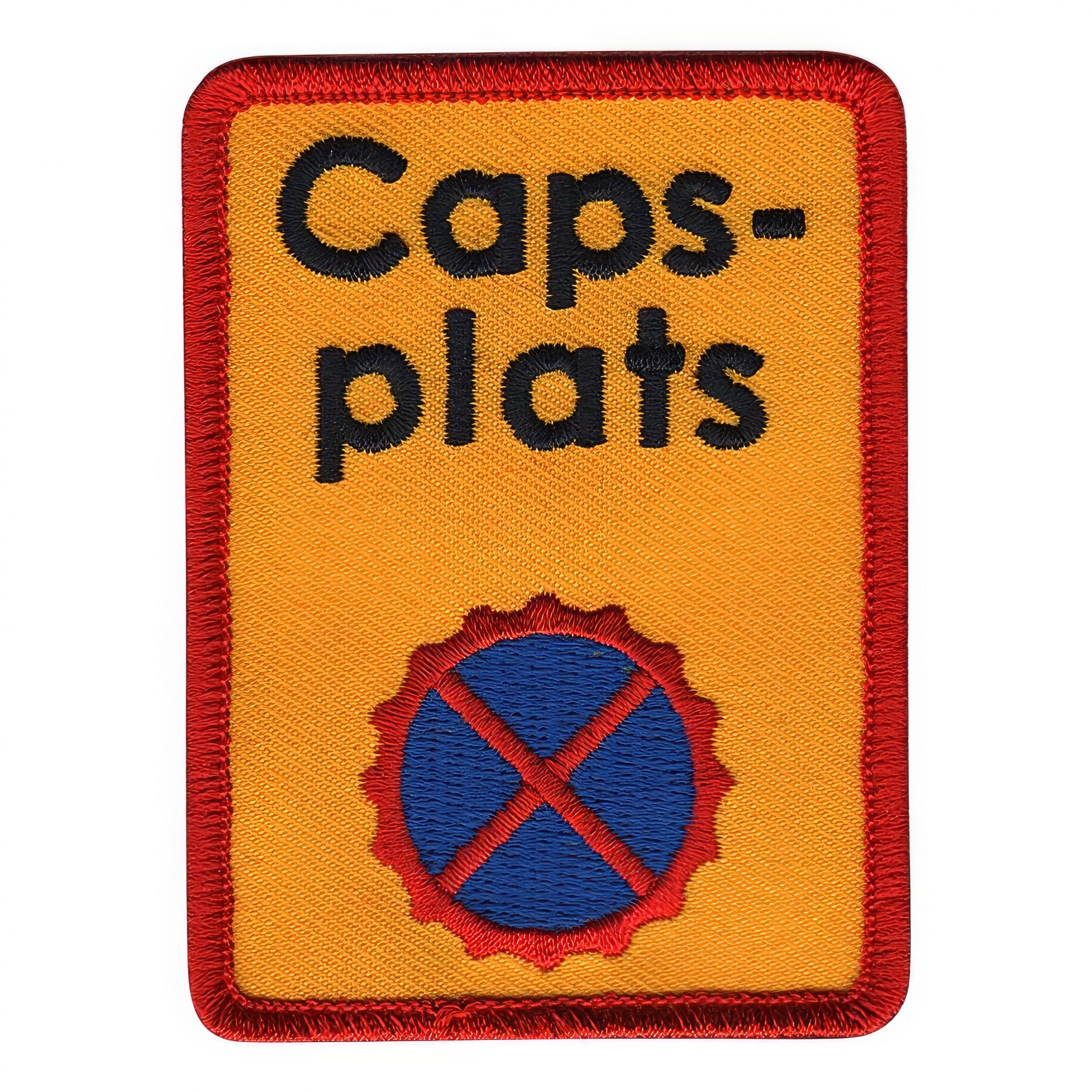 Tygmärke Caps-plats
