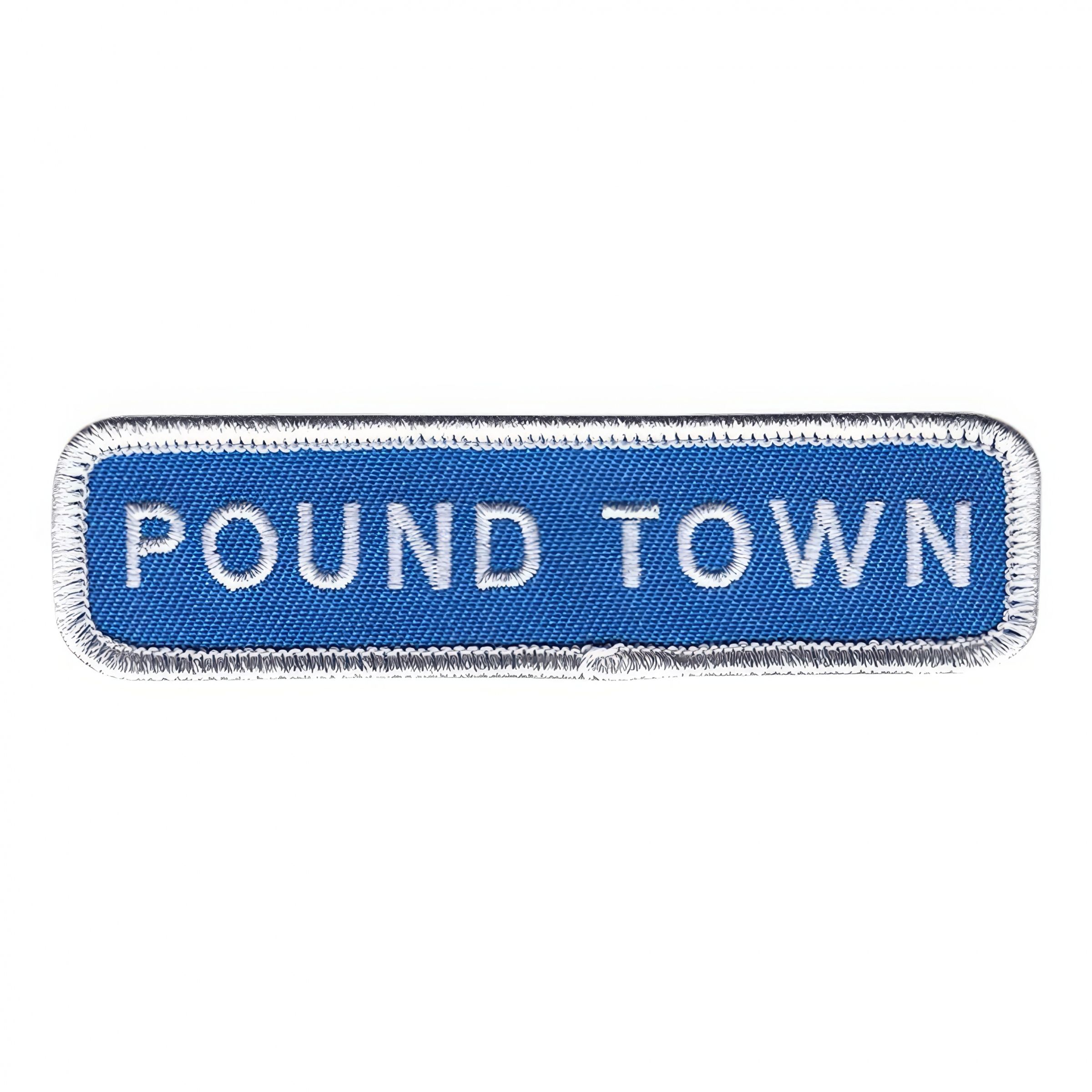 Läs mer om Tygmärke Pound Town Vägskylt