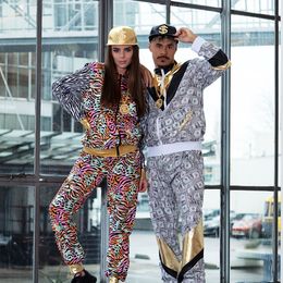 Lysbildefremvisning - Dollar Dude Tracksuit Kostume