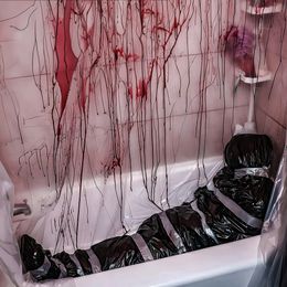 Diaesitys - Ruumis Mustassa Muovisäkissä