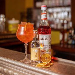 Lysbildefremvisning - Monin Orange Spritz Syrup