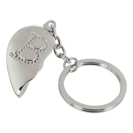 Lysbildefremvisning - Nøglering Halvt Hjerte med Bogstav