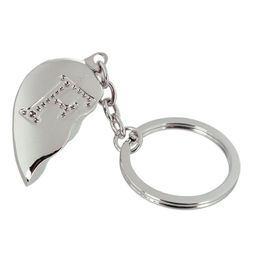 Lysbildefremvisning - Nøglering Halvt Hjerte med Bogstav