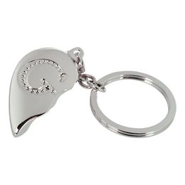 Lysbildefremvisning - Nøglering Halvt Hjerte med Bogstav