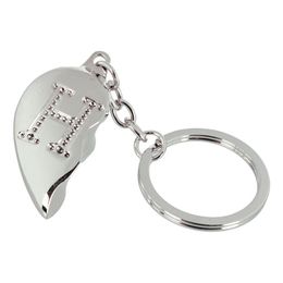 Lysbildefremvisning - Nøglering Halvt Hjerte med Bogstav