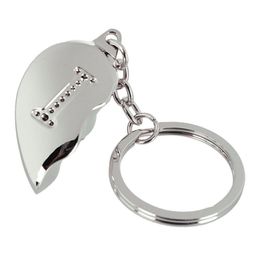 Lysbildefremvisning - Nøglering Halvt Hjerte med Bogstav