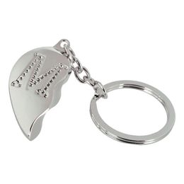 Lysbildefremvisning - Nøglering Halvt Hjerte med Bogstav