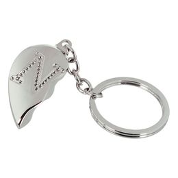 Lysbildefremvisning - Nøglering Halvt Hjerte med Bogstav