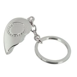 Lysbildefremvisning - Nøglering Halvt Hjerte med Bogstav