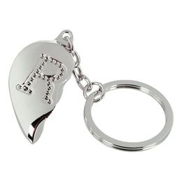 Lysbildefremvisning - Nøglering Halvt Hjerte med Bogstav