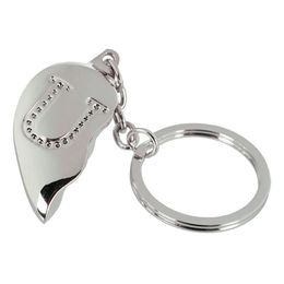 Lysbildefremvisning - Nøglering Halvt Hjerte med Bogstav