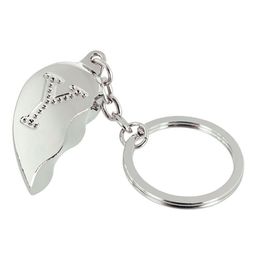 Lysbildefremvisning - Nøglering Halvt Hjerte med Bogstav