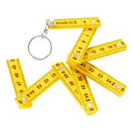 Bildspel - Nyckelring Tumstock Vikbar