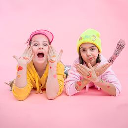 Lysbildefremvisning - Tatoveringer Daisy