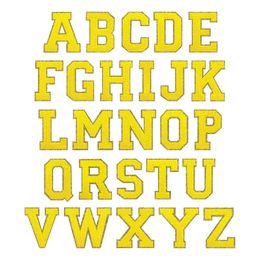 Tygmärke Bokstav Gul