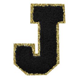 Lysbildefremvisning - Stoffmerke Svart Bokstav