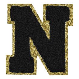 Lysbildefremvisning - Stoffmerke Svart Bokstav