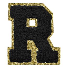 Lysbildefremvisning - Stoffmerke Svart Bokstav