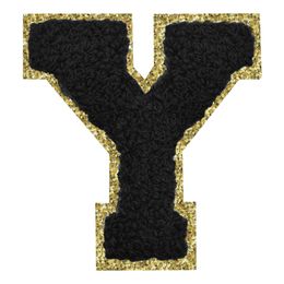 Lysbildefremvisning - Stoffmerke Svart Bokstav