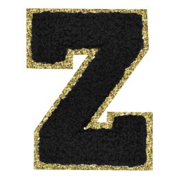 Lysbildefremvisning - Stoffmerke Svart Bokstav