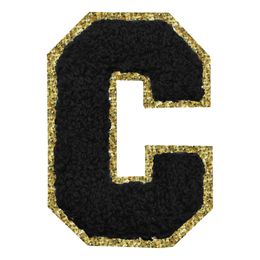 Lysbildefremvisning - Stoffmerke Svart Bokstav