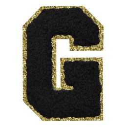 Lysbildefremvisning - Stoffmerke Svart Bokstav