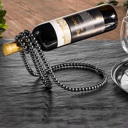 Bildspel - Vinhållare Pärlhalsband